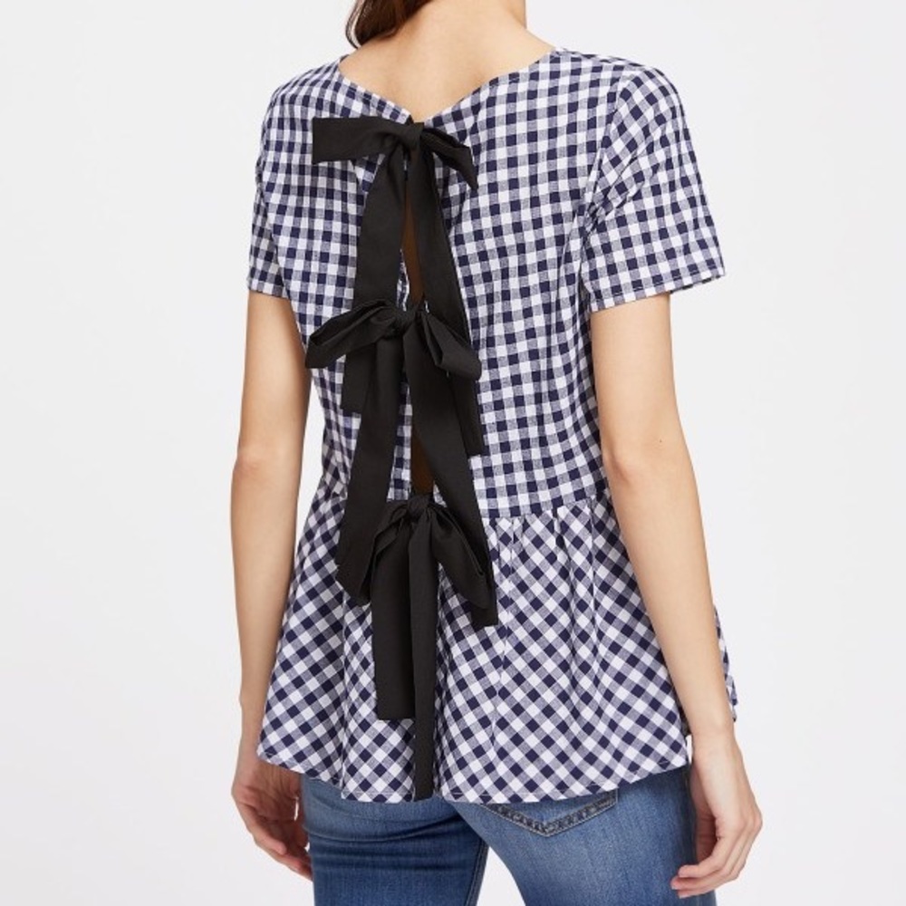 Never worn adorable gingham top with black bows.
